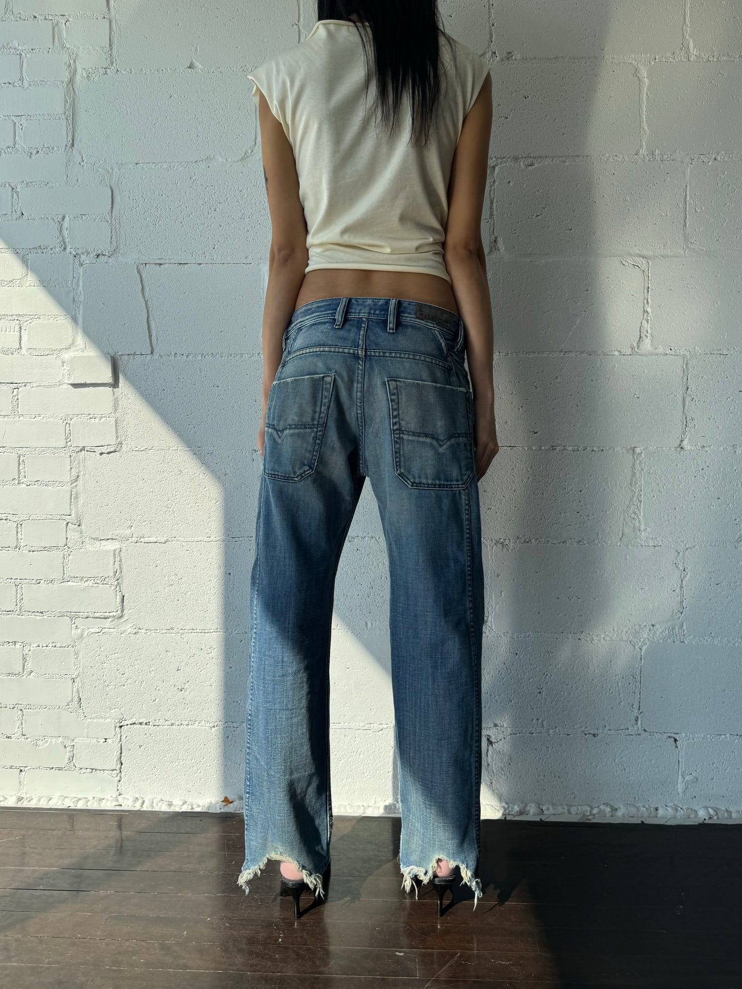 distressed wide jeans / ripped hems