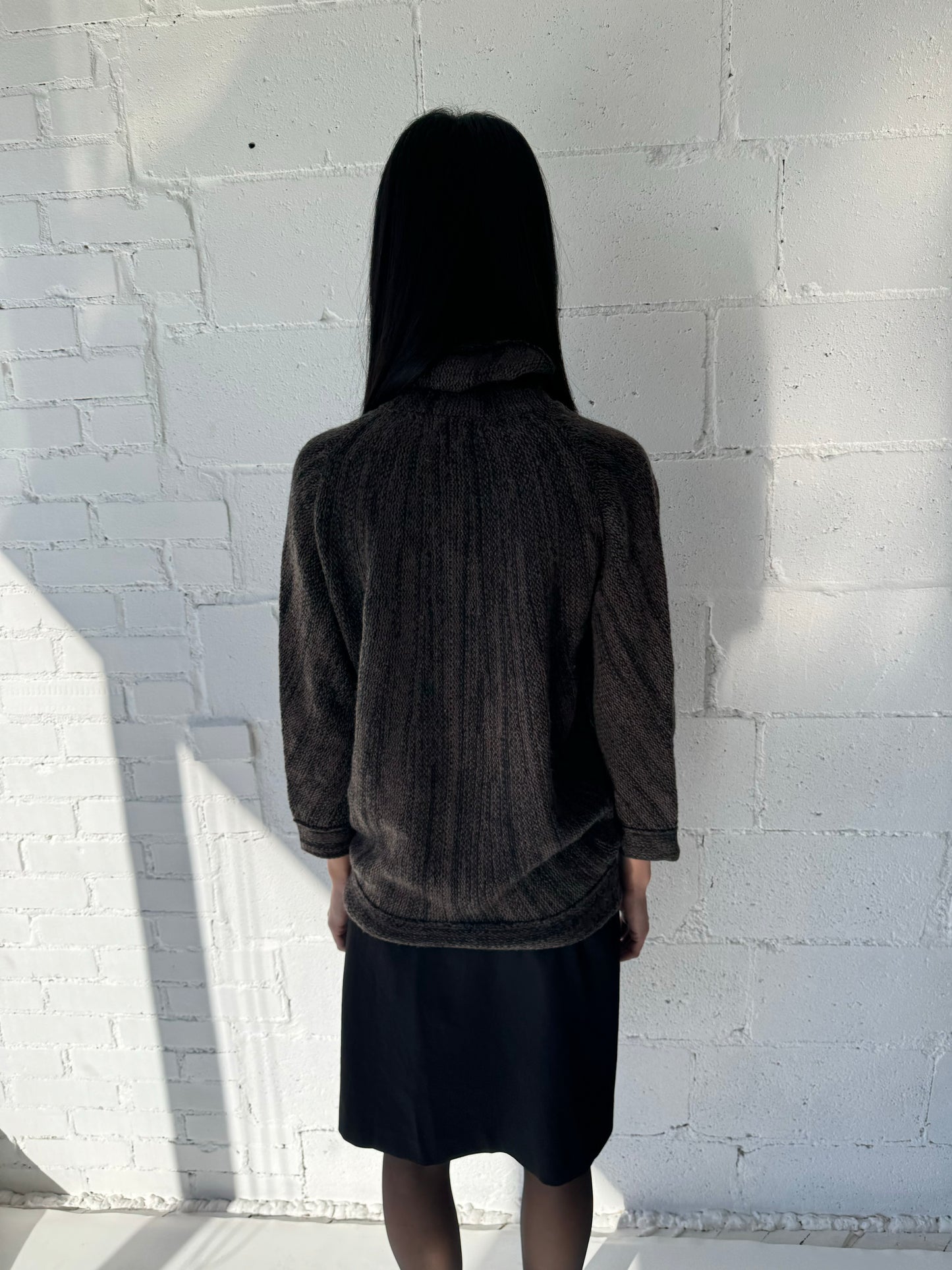 turtleneck / brown marble