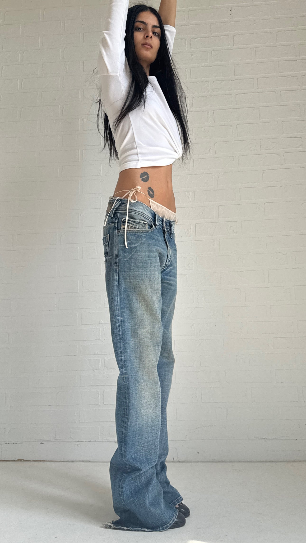 Distressed Low-Rise Bootcut Jeans