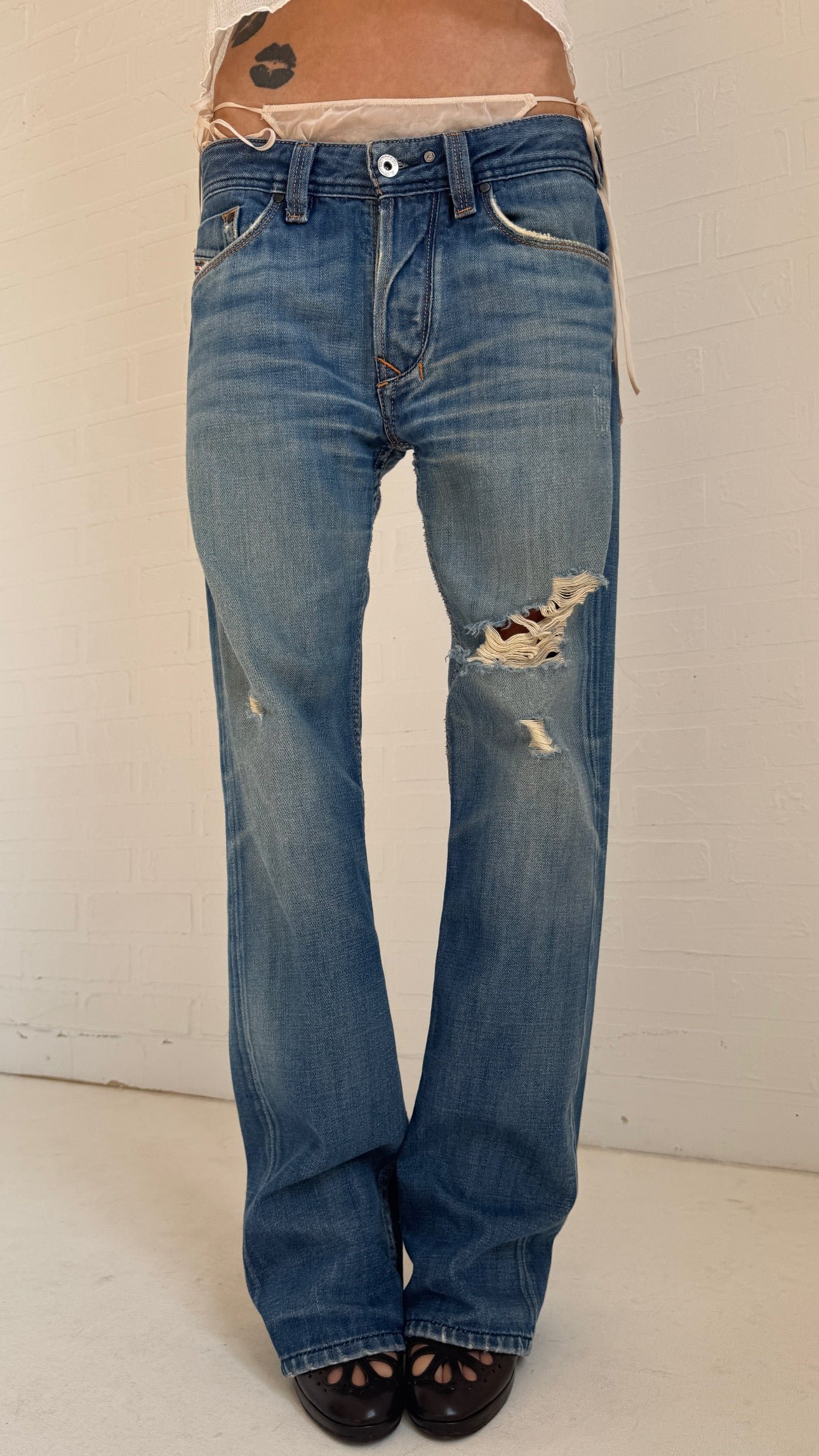 Embroidered Distressed Bootcut Jeans