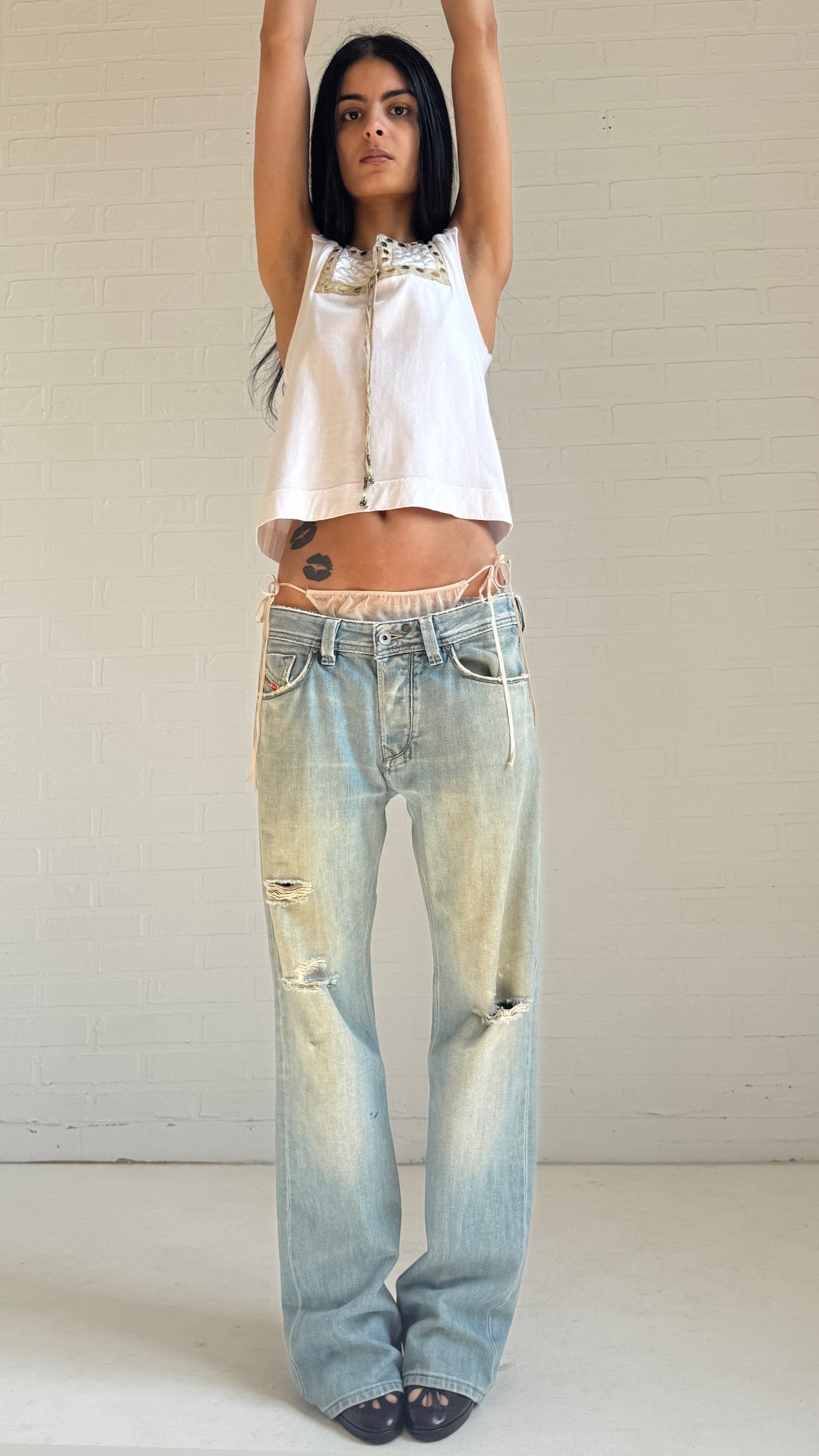 Embroidered Distressed Bootcut Jeans