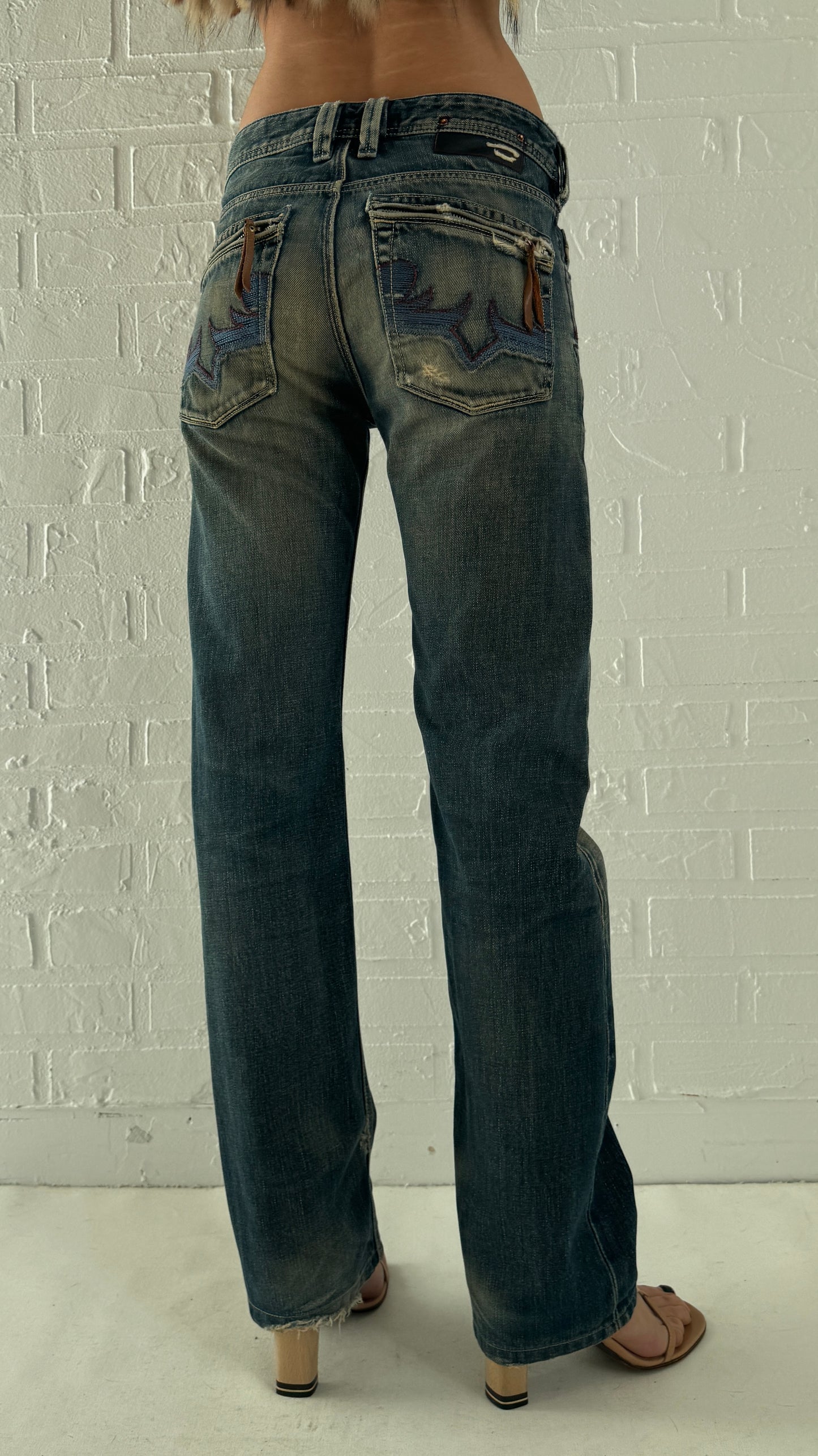 distressed embroidered pocket jeans