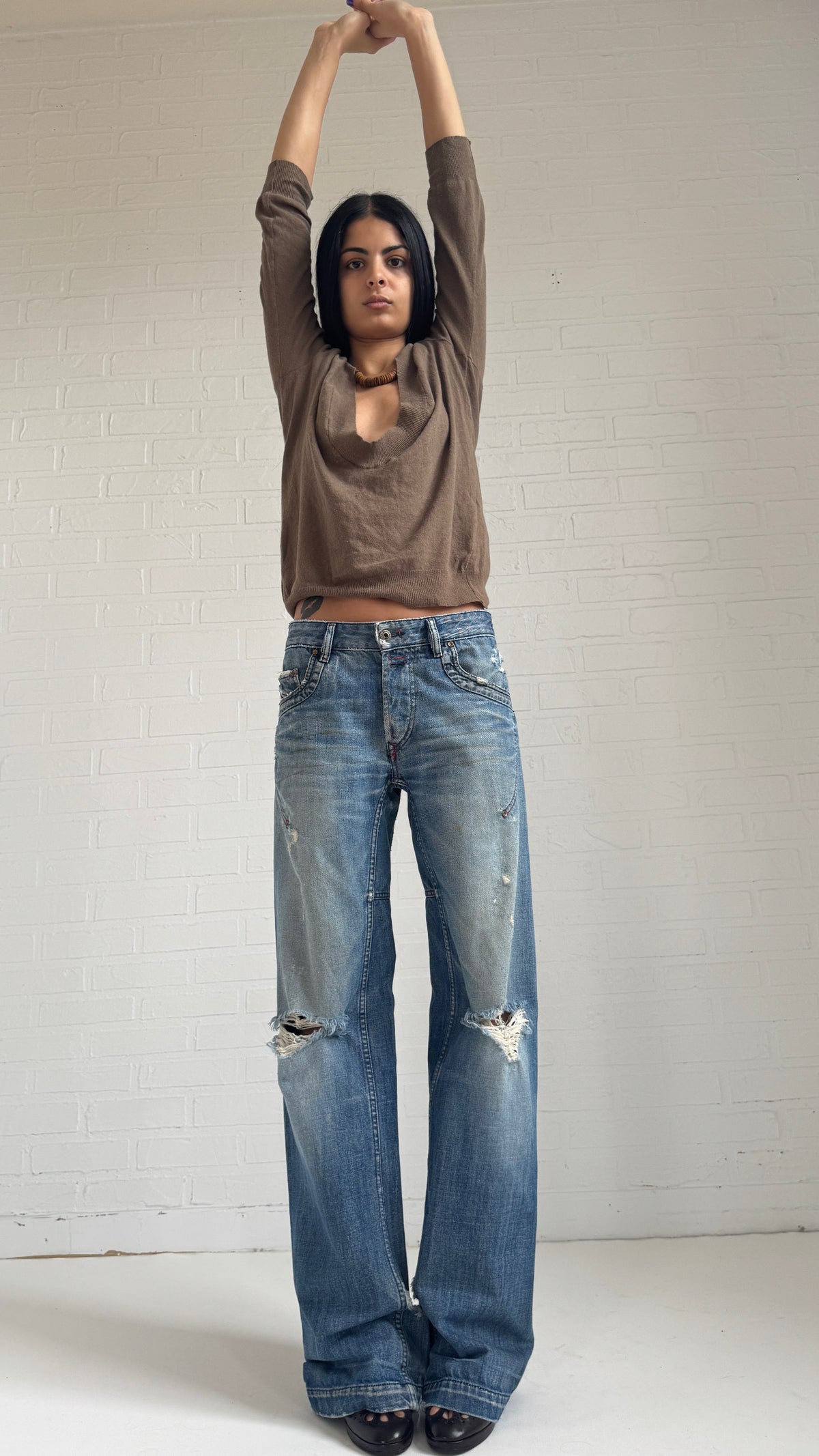 Distressed Wide Curved Leg Jeans