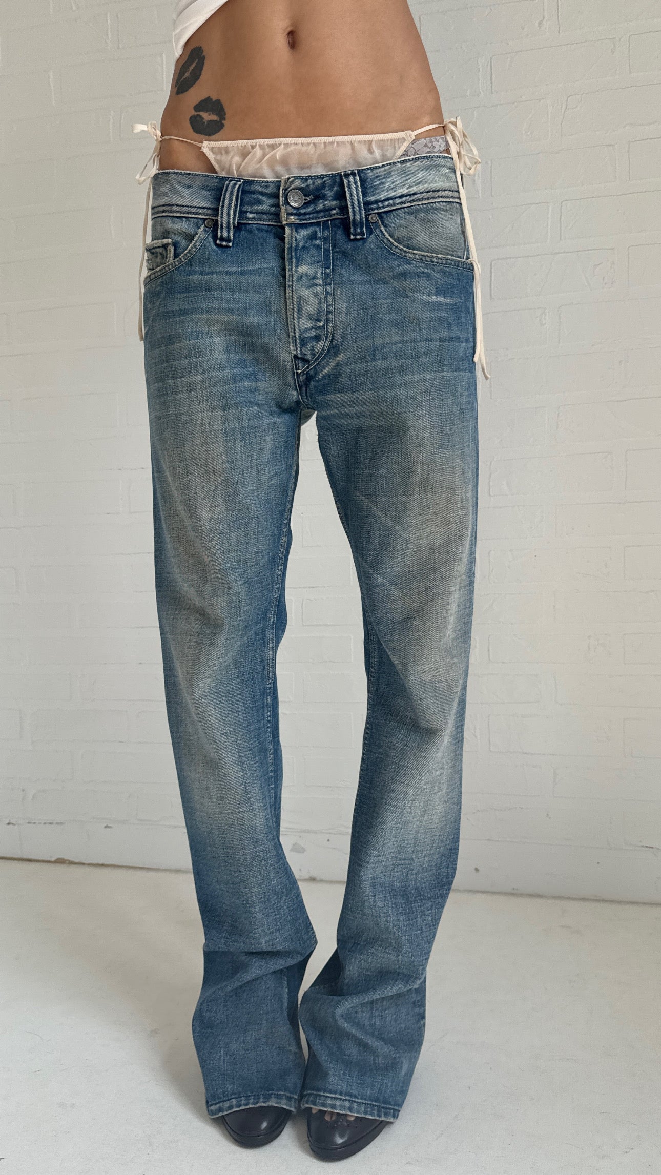 Distressed Low-Rise Bootcut Jeans