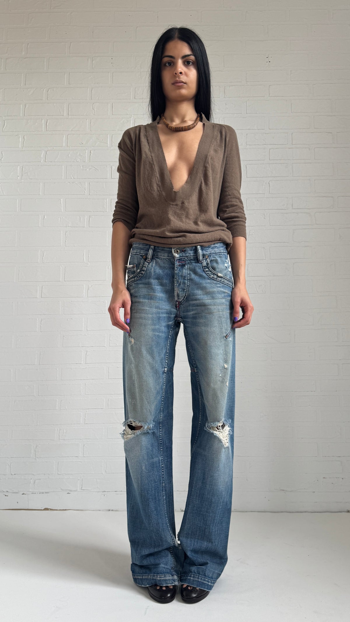 Distressed Wide Curved Leg Jeans